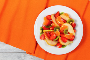 strawberry, kiwi fruit, pear, mandarin salad