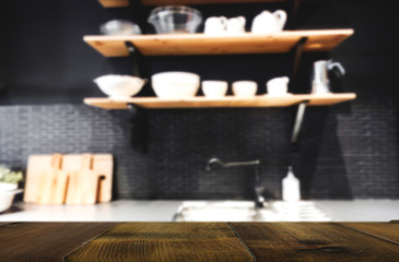 Wood table on blur Interior of kitchen background