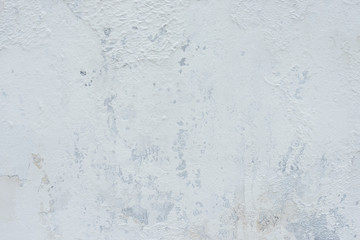 Wall fragment with scratches and cracks