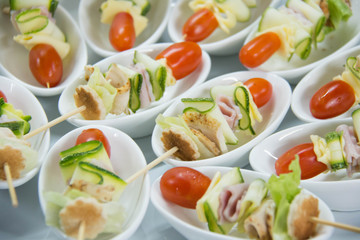 cocktail food on a white mini cup