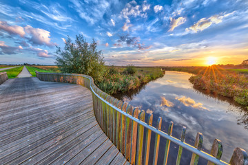 Vivid sunset over Wooden Balustrade