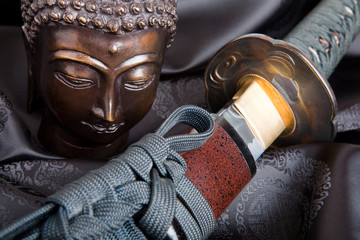 Buddha versus sword
