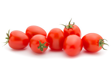 Small plum tomatoes on a white background.