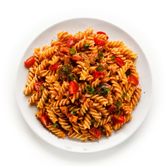 Pasta with tomato sauce on white background