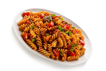 Pasta with tomato sauce on white background
