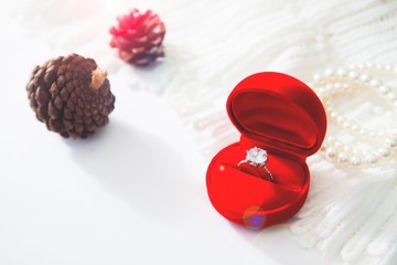 Wedding ring, Diamond ring in red box. Selective focus with copy space
