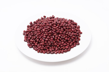 Red bean in white plate on the white background