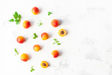 Apricot on white background. Sliced apricot top view, flat lay