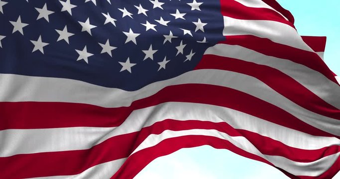 Close up USA flag blowing in the wind, looped slowmotion, 4K