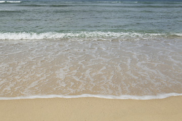 Wave on the sand beach in Thailand sea.