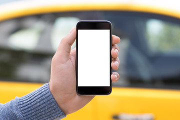 Man hand holding phone isolated screen background yellow taxi car