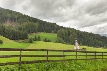 Wooden fence next to  an Italian mountain pasture © TonelloPhotography