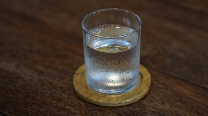 a glass of water. cold water. 