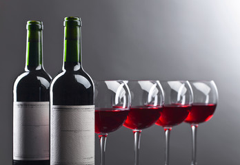 Bottles and glasses of red wine