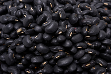 closeup the seed black bean as background