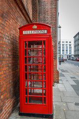 Fototapeta na wymiar Red phone cabin in a London street