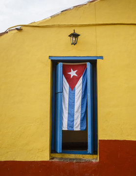 Cuban flag in a house window, Trinidad, Sancti Sp&rsquo;ritus province, Cuba.