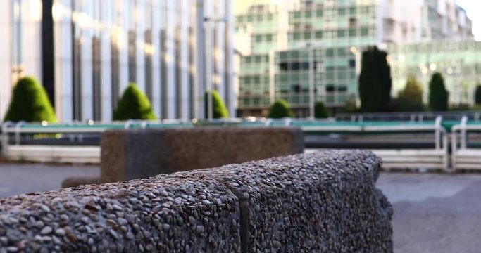 Man jumping over a wall in the city during a parkour session