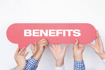 Group of people holding the BENEFITS written speech bubble