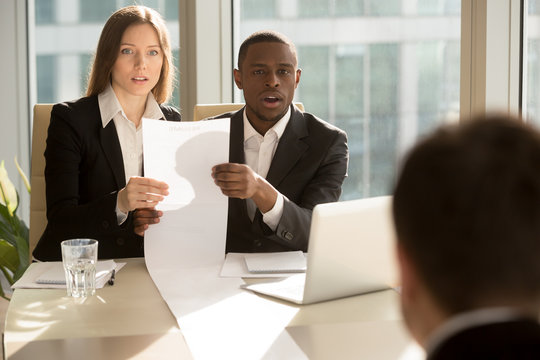 Multiracial Recruiters Holding Long Sheet Of Paper, Looking Surprisingly At Candidate During Job Interview, Prepared Detailed Resume With Great Career Achievements, Impressive Work Accomplishments