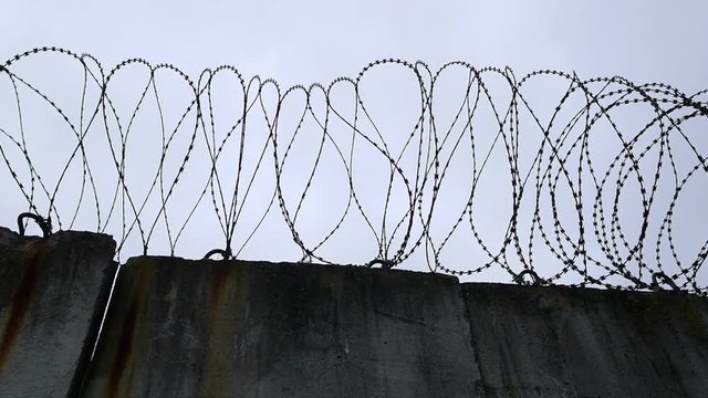 wall with barbed wire.