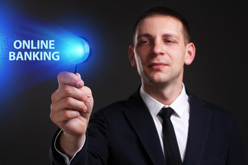The concept of business, technology, the Internet and the network. A young entrepreneur working on a virtual screen of the future and sees the inscription: Online banking