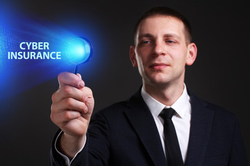 The concept of business, technology, the Internet and the network. A young entrepreneur working on a virtual screen of the future and sees the inscription: Cyber insurance