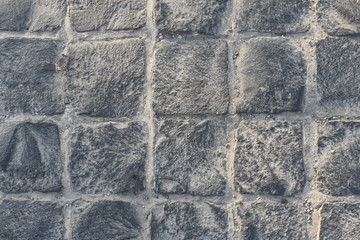 Stone paving texture. Abstract structured background of modern street pavement slabs pattern