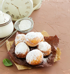 Donuts In powdered sugar.