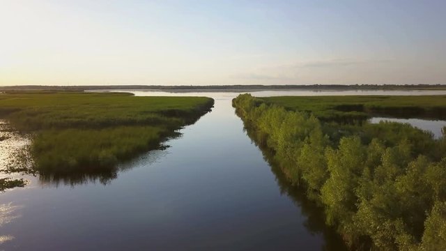 Danube delta wetlands at sunset aerial view