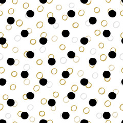 Simple fabric design with black and white polka dots.