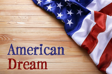 Fototapeta na wymiar Flag of United States of America on wooden background