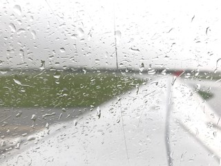 rain drop on airplane window