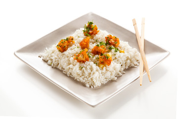 Chicken nuggets with rice on white background