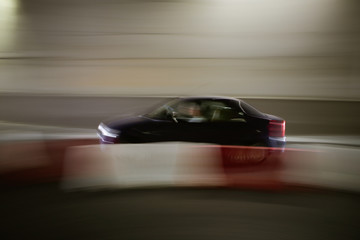 Car speeding in a tunnel