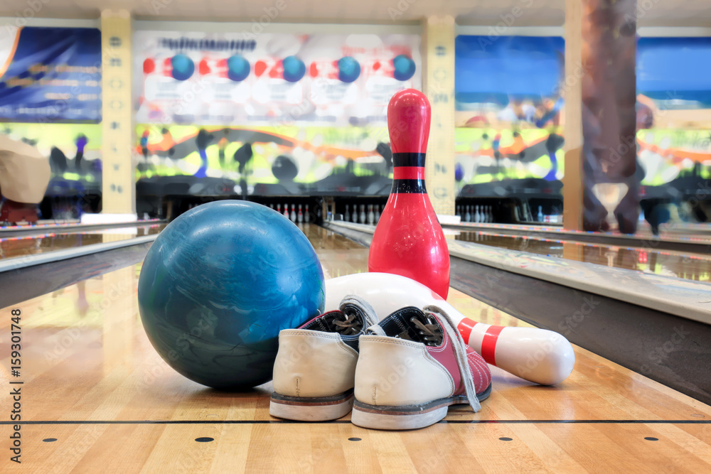 Poster Ball, shoes and pins on floor in bowling club