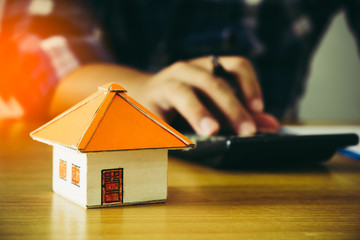 Closeup of man counting payments for home