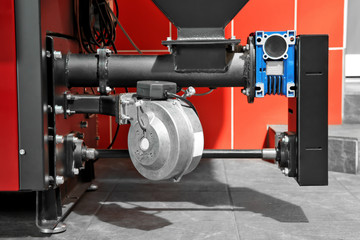 Part of solid fuel boiler, close up. Energy savings concept