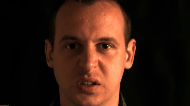 The face of evil men distorted random characters. Concept: a glitch in the matrix. glitch chromatic aberration.
