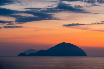 Obraz na płótnie Canvas Beautiful colorful Filicudi and Alicudi eolian islands view at sunset in summer from Pollara in Salina island