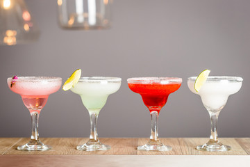 Four Glasses of Different Kind and Color Cocktails, Summer Time, Horizontal Wallpaper