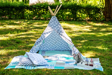 Wigwam for small children. The concept of lifestyle and decor.