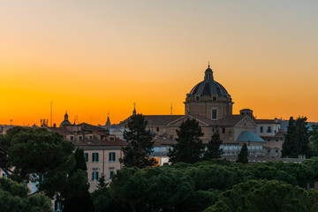 Fototapeta na wymiar Sunset over Rome and St Peters Basilica