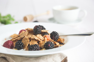 Flakes of cereals with fresh berries, a healthy breakfast