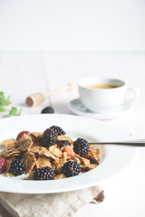 Flakes of cereals with fresh berries, a healthy breakfast