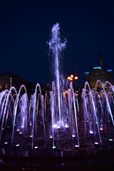 Glowing fountain at night