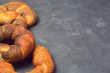 Bakery background with varity of bagels over blackboard
