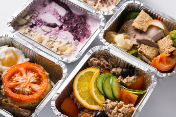 Healthy food take away in foil boxes
