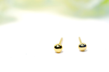 Gold pendant cameo jewelry in sphere shape isolated on white