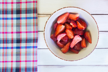 Dessert of fresh strawberries with cream